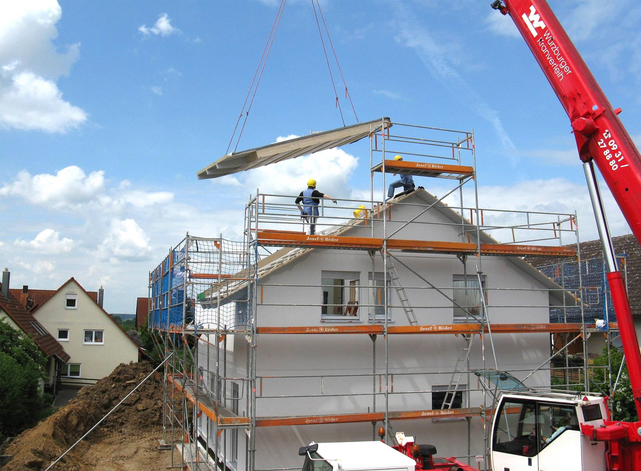 Housebuilders and a crane