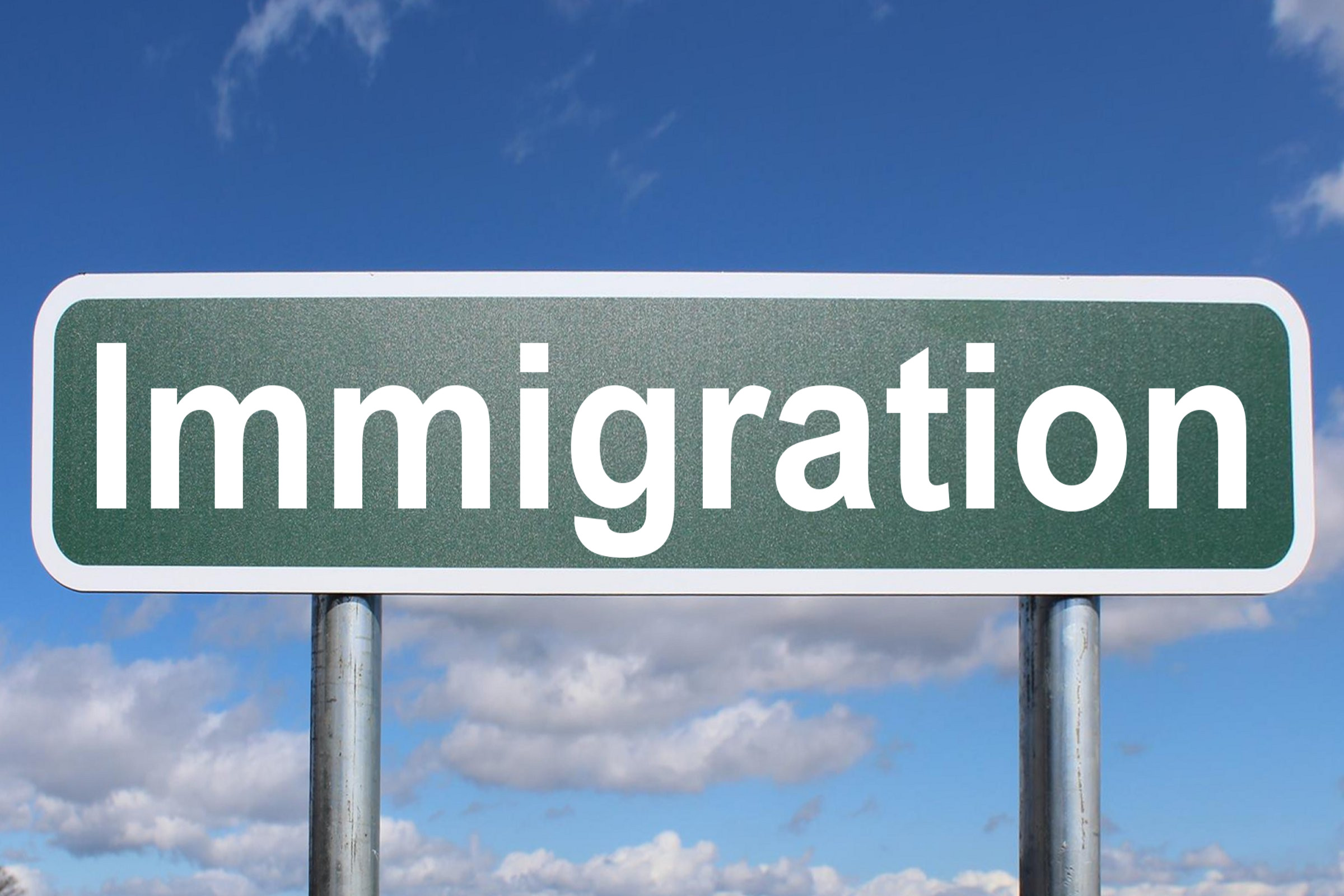 immigration-free-of-charge-creative-commons-highway-sign-image