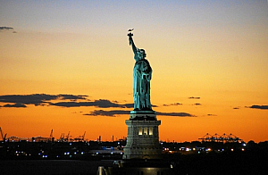 statue of liberty silhouette new york sunset