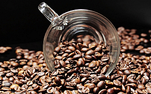 Coffee beans and glass cup