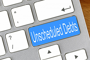 unscheduled debts